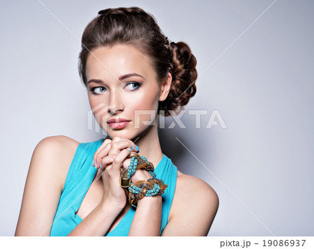 Young beautiful woman with jewelry. Young beautiful woman with jewelry. 19086937