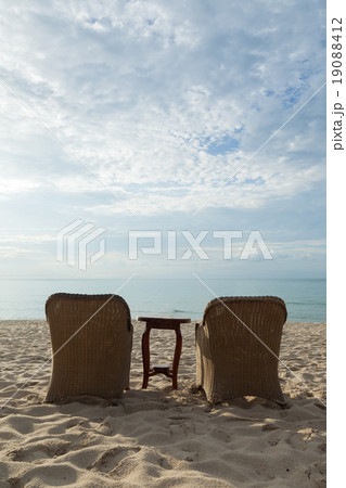 Chairs and tables on the beach 19088412