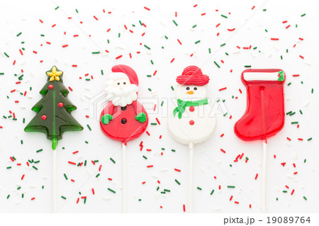 クリスマステーマ ロリポップキャンディー サンタ 雪だるま クリスマスツリー ソックスの写真素材