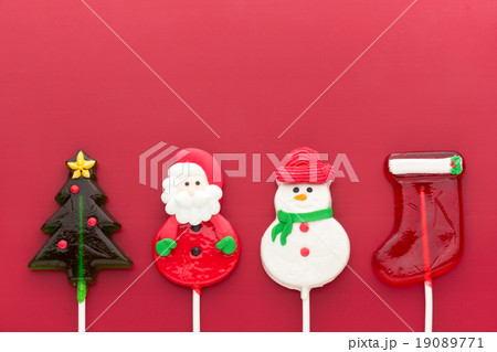 クリスマステーマ ロリポップキャンディー サンタ 雪だるま クリスマスツリー ソックスの写真素材