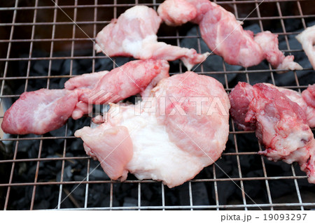 Pork is grilled. Pork is grilled. 19093297