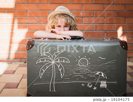 Little girl with vintage suitcase. Travel concept 19104175