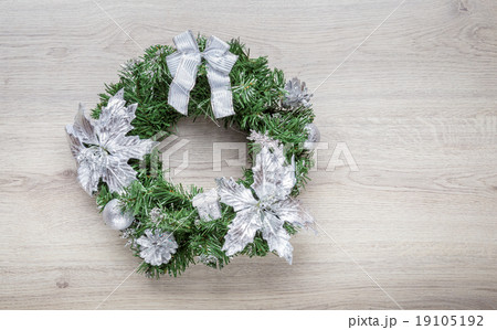 Christmas blue wreath on wood Christmas blue wreath on wood 19105192
