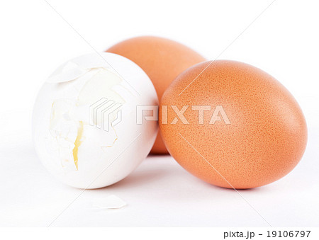 One broken and two whole eggs on white background One broken and two whole eggs on white background 19106797