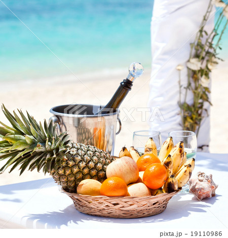 Beautiful wedding arch on tropical beach 19110986