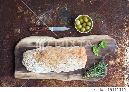 Freshly baked homemade ciabatta bread with olives Freshly baked homemade ciabatta bread with olives 19111536