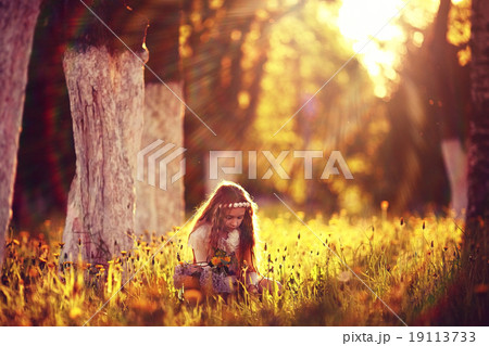 girl collects flowers childhood 19113733