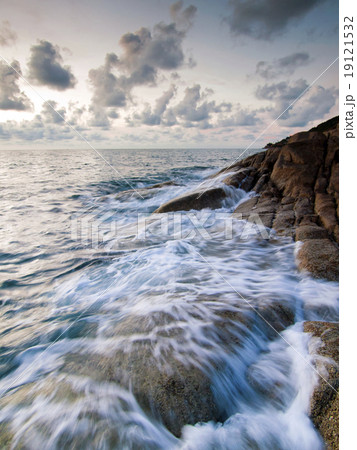 Beautiful seascape. Sea and rock at the sunset Beautiful seascape. Sea and rock at the sunset 19121532