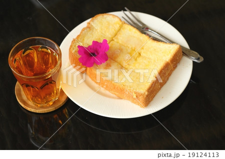 Bread, butter, topped milk with tasty and tea Bread, butter, topped milk with tasty and tea 19124113