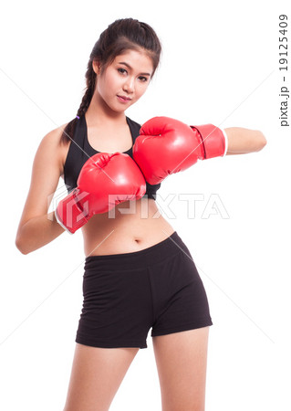 Fitness woman with the red boxing gloves Fitness woman with the red boxing gloves 19125409