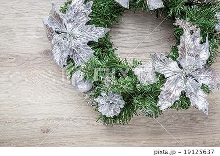 Christmas blue wreath on wood Christmas blue wreath on wood 19125637