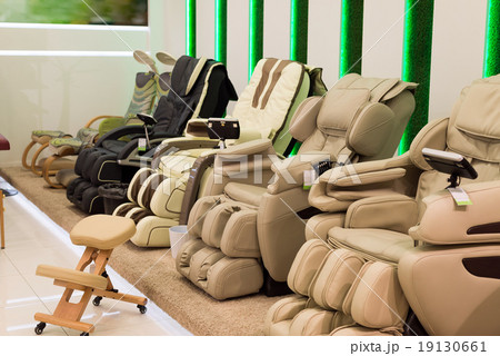 Beige massage chairs in the store 19130661