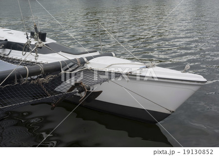 sailboat on a black lake on the quayside 19130852