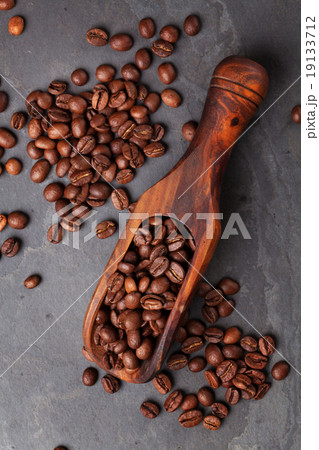 Coffee beans on stone table 19133712