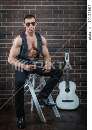 The guy with the guitar. The guy with the guitar. 19135807