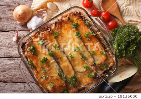 moussaka closeup in baking dish and ingredients moussaka closeup in baking dish and ingredients 19136000