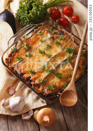 Greek moussaka closeup in baking dish Greek moussaka closeup in baking dish 19136003