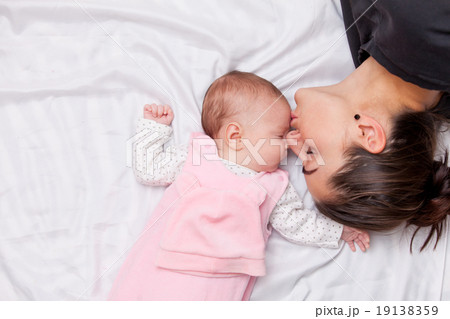Mother and little baby Mother and little baby 19138359