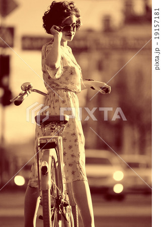 girl on a bicycle spring morning 19157181