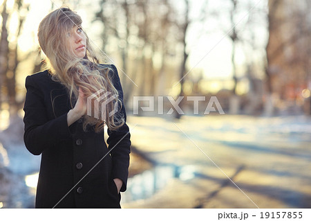 portrait of a girl with long blond hair outside in the spring portrait of a girl with long blond hair outside in the spring 19157855