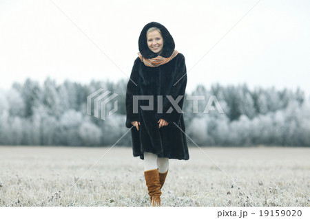 girl in a mink coat winter snow 19159020