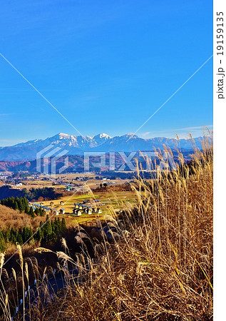 小千谷山本山高原からの越後三山冬景色展望の写真素材