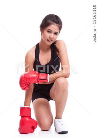 Fitness woman with the red boxing gloves Fitness woman with the red boxing gloves 19165110