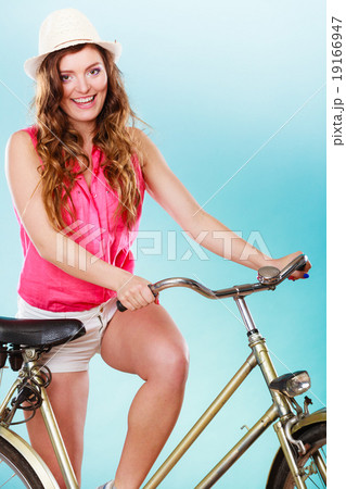 Active woman riding bike bicycle. Recreation. 19166947