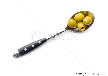 pitted green olives in spoon pitted green olives in spoon 19167339