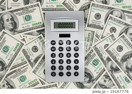 Background of $ 100 bills and a calculator 19167776