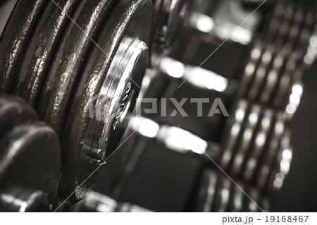 Gym interior close up, machinery and weightlifting Gym interior close up, machinery and weightlifting 19168467