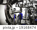 Gym interior close up, machinery and weightlifting 19168474
