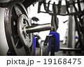 Gym interior close up, machinery and weightlifting 19168475
