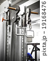 Gym interior close up, machinery and weightlifting 19168476