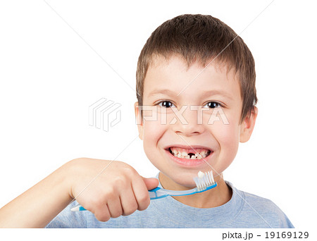 Boy portrait with lost tooth on toothbrush Boy portrait with lost tooth on toothbrush 19169129