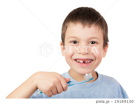 Boy portrait with lost tooth on toothbrush Boy portrait with lost tooth on toothbrush 19169130