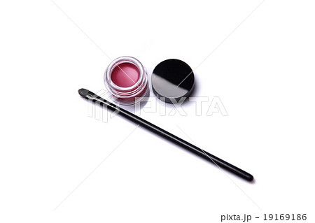Red lip gloss in jar with makeup brush 19169186