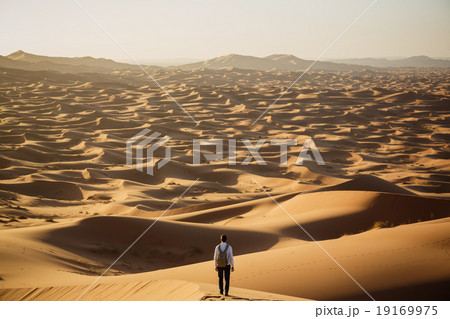 Man lost in desert dunes 19169975