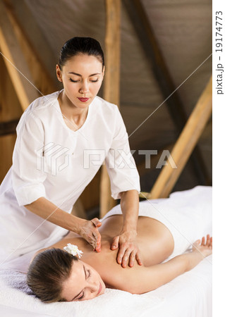 Woman enjoying massage. 19174773