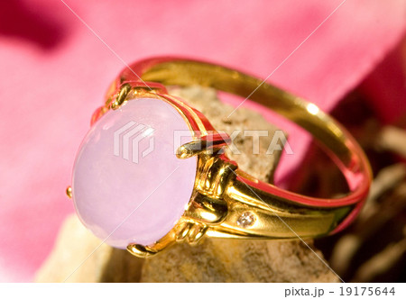 Pink jade gold ring with beautiful background 19175644