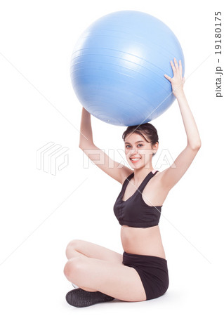 Young woman doing exercises with fitness ball. Young woman doing exercises with fitness ball. 19180175