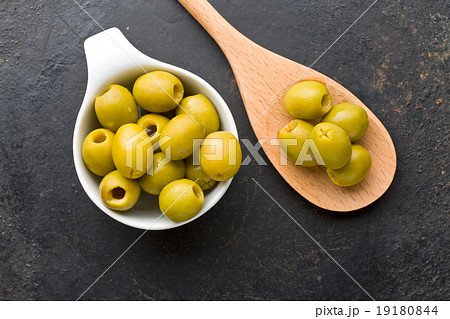 pitted green olives in bowl pitted green olives in bowl 19180844