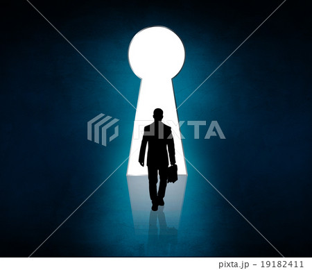 Silhouette stands near big keyhole exit.  19182411