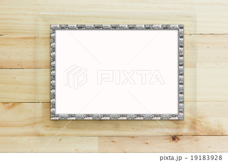 glass frame on wooden background. glass frame on wooden background. 19183928