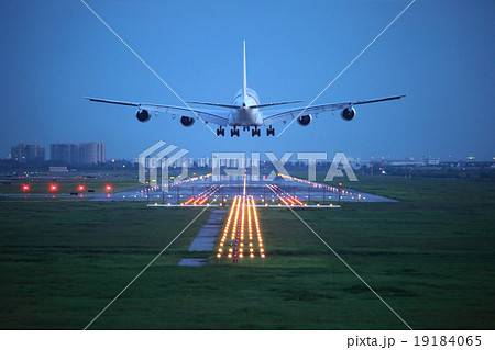 passenger plane fly up over take-off runway 19184065