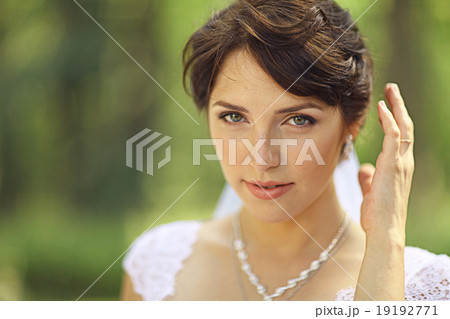 Portrait of a bride in a white dress Portrait of a bride in a white dress 19192771