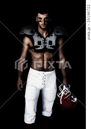 Composite image of portrait of rugby player wearing shoulder pad Composite image of portrait of rugby player wearing shoulder pad 19196722
