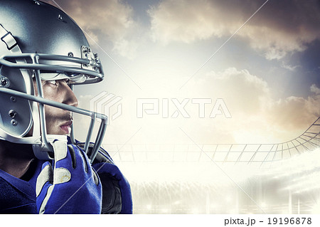 Composite image of sportsman wearing helmet looking away 19196878