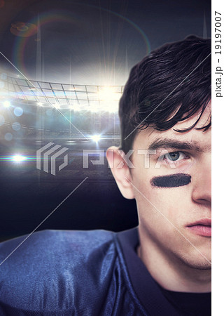 Composite image of american football player looking at the camer Composite image of american football player looking at the camer 19197007