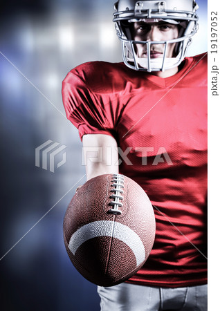 Composite image of sportsman showing american football 19197052